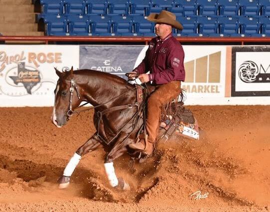 Corey Cushing on a galloping brown horse